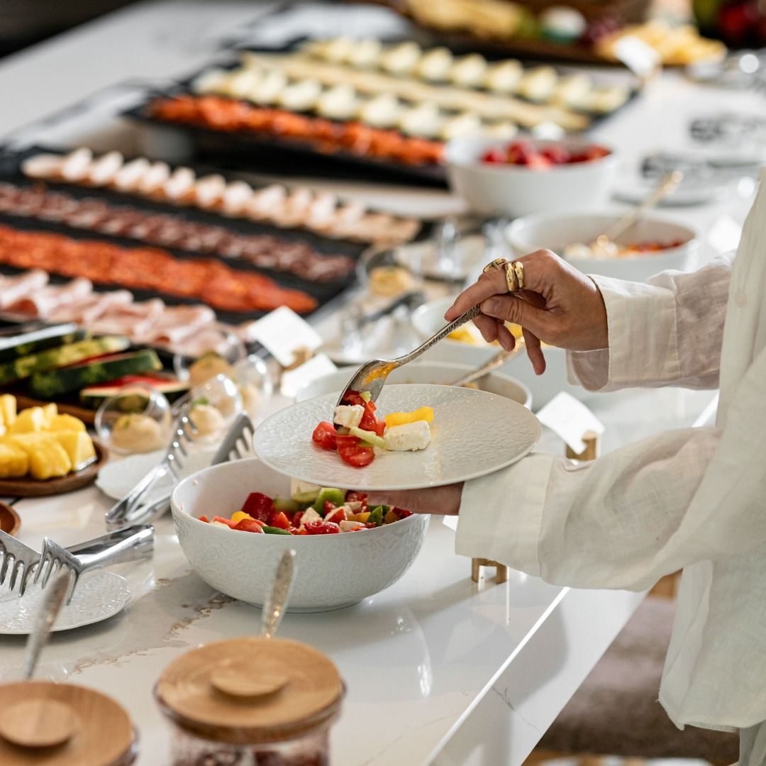 Elegantly plated salad and starter at a buffet